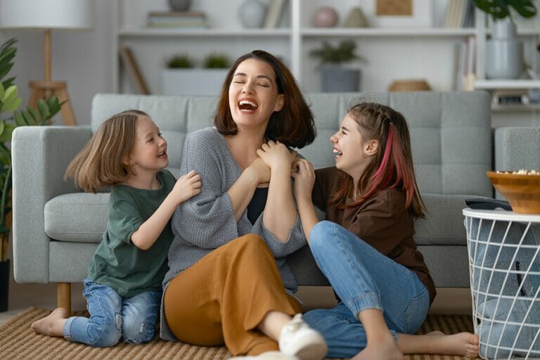 Family Laughing on Floor