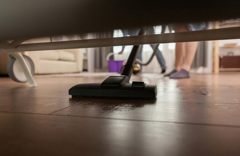 Deep Cleaning & Sanitizing 9 Vaccuming under Couch